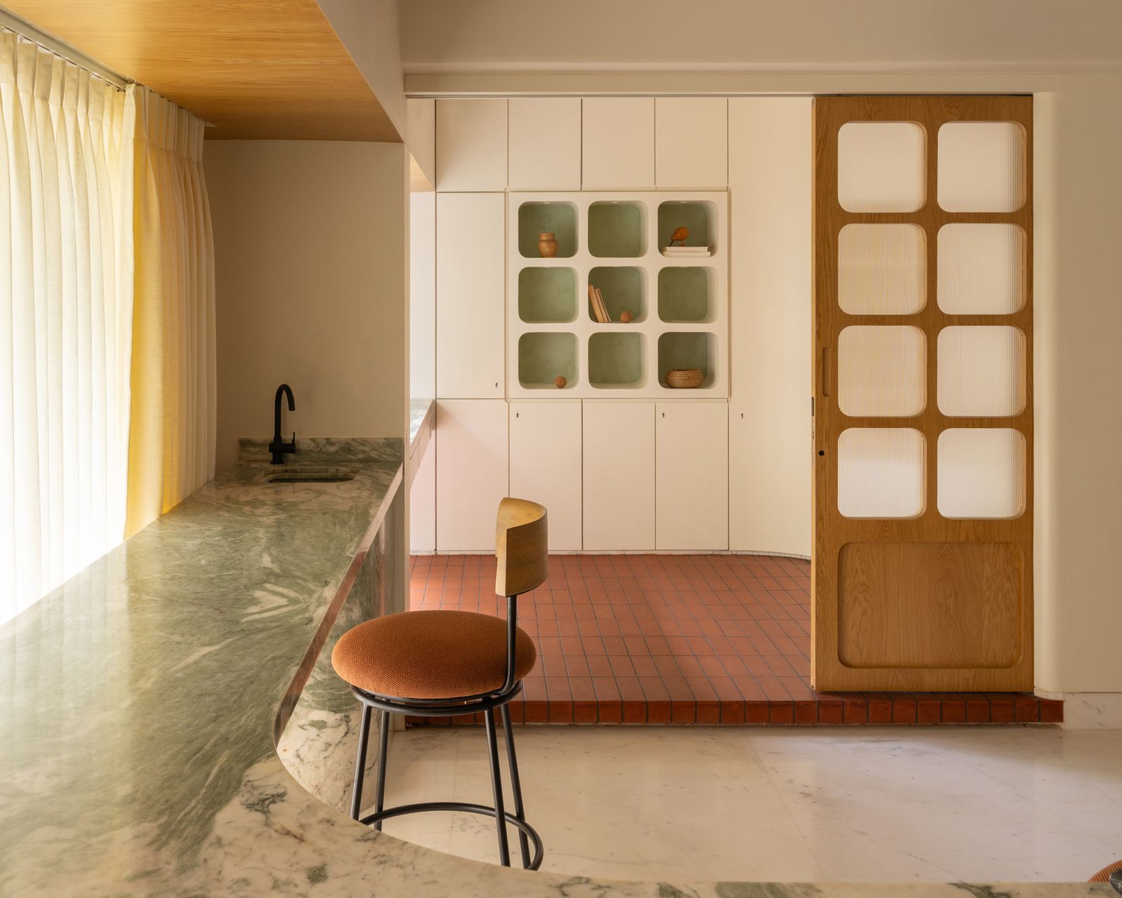 In Mumbai, Kaviar Collaborative helped a couple turn a lackluster event space into a cozy home with flowing spaces and storage to spare.