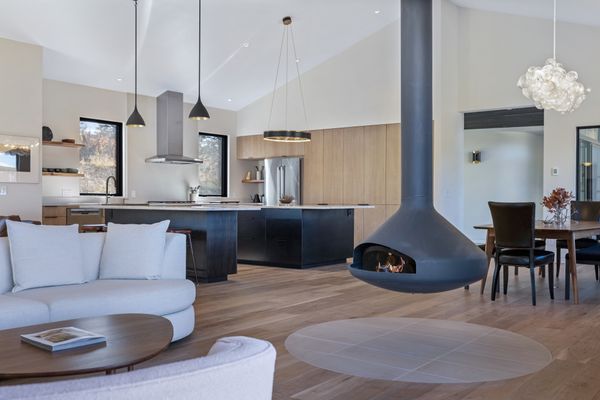 From the patio, large sliding glass doors lead to the great room, facilitating seamless indoor/outdoor flow.