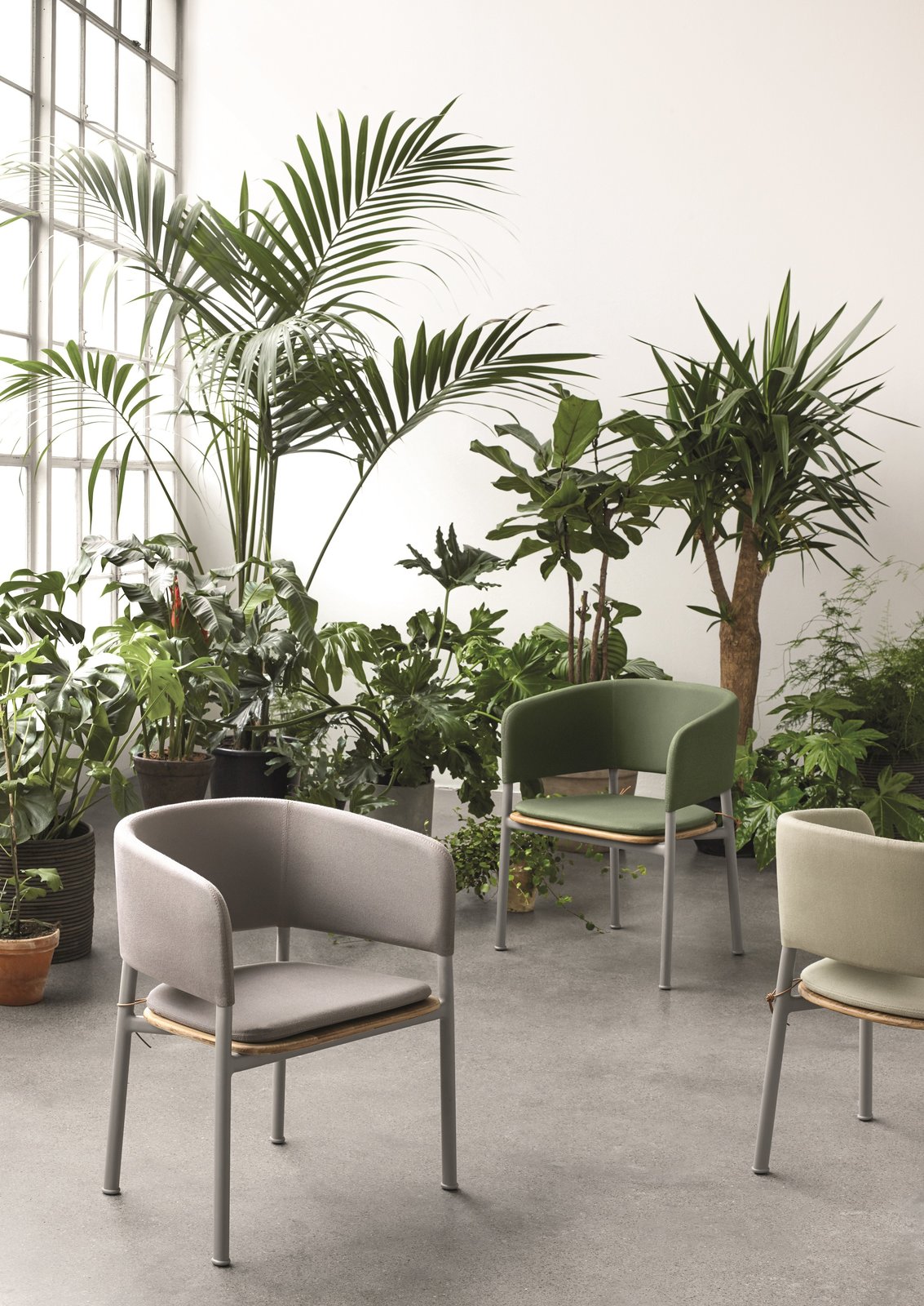 The Atmosphere collection is a strong, minimalist mix of powder-coated aluminium frames paired with Gloster’s signature teak and cleverly designed panels that have been upholstered with weather-resistant outdoor fabric from Sunbrella. Cecilie thoughtfully selected the Gloster-exclusive palette in muted, modern shades to complement the silvery grey patina the wood will eventually adopt.