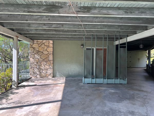 Before: The home’s original entryway was in a state of disrepair