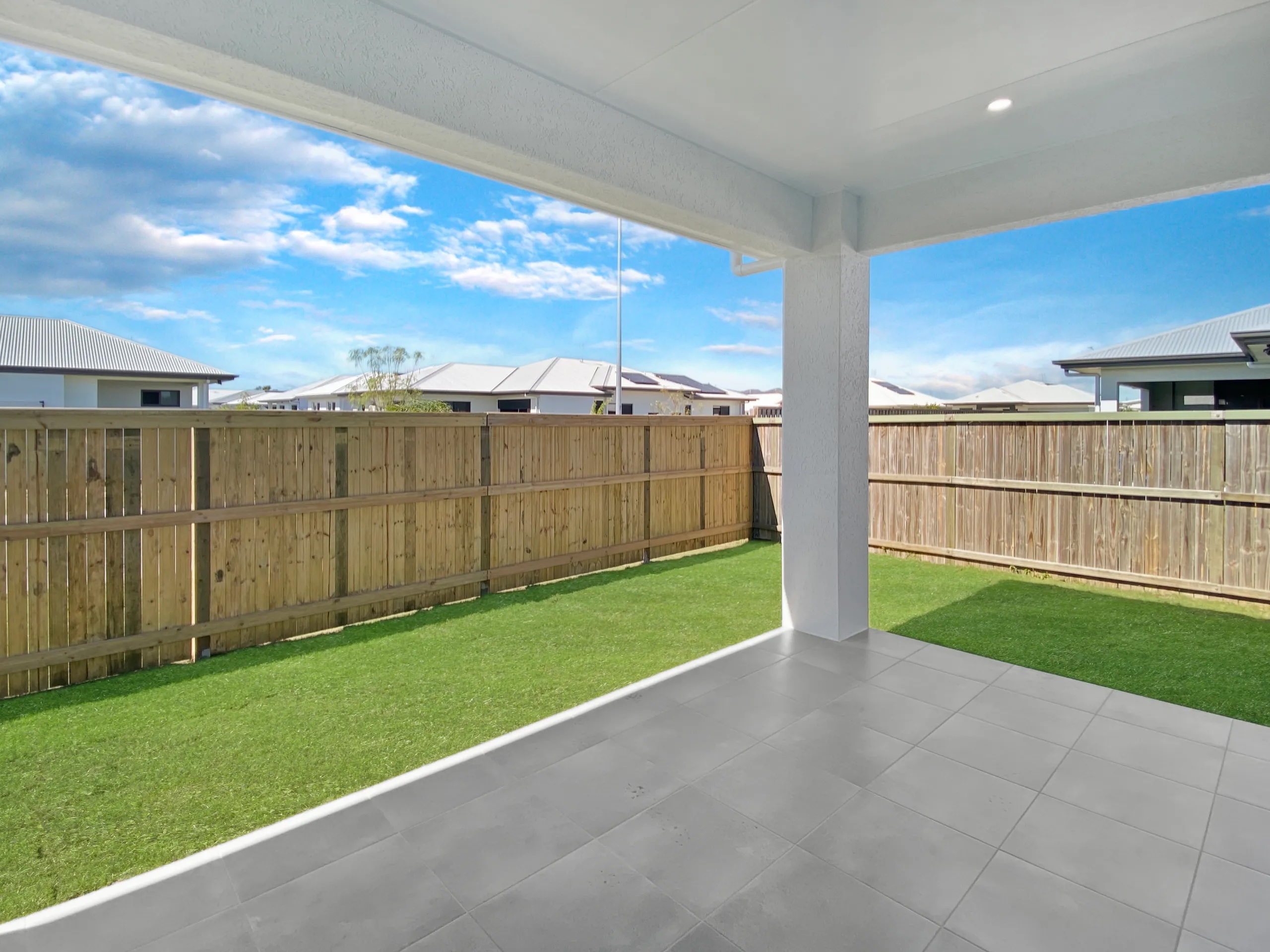 Covered patio and fully fenced yard