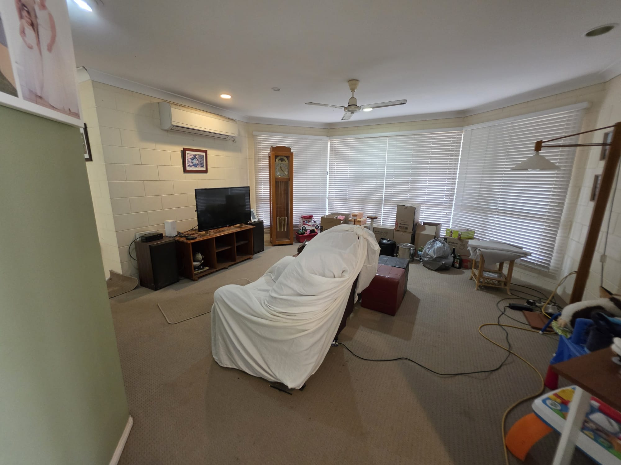 Living room with split system air conditioning