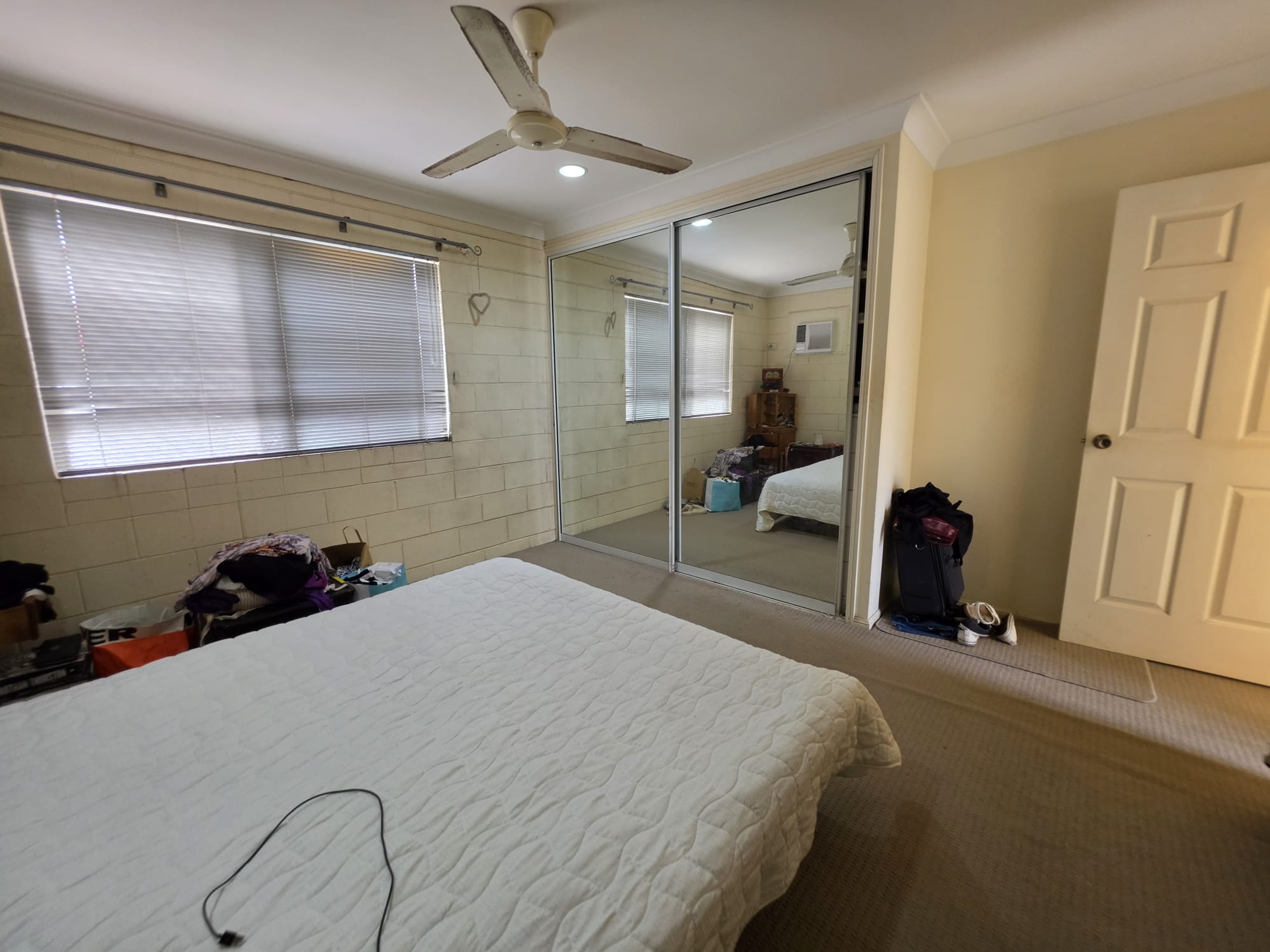 Main bedroom with mirrored built-in robes