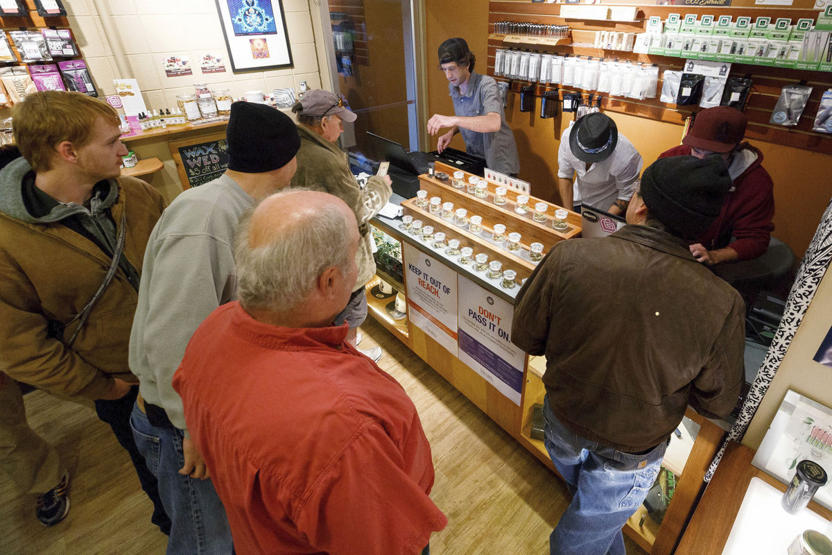Patrons at Amazon Organics, a marijuana dispensary in Eugene, Oregon.