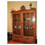 wooden antique cabinet with glass doors