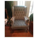 Two blue tufted wing backed chairs