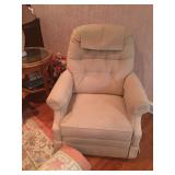small beige rocker recliner
