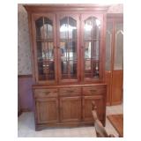 Thomasville lighted china cabinet. I believe it is cherry. $195