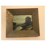 Painting with wide wood frame. 