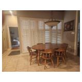 Pine kitchen table with six cjhairs and one leaf