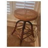 antique caned stool