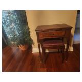 antique sewing table with Singer sewing machine inside
