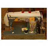 •	Vogue Stitch 130 portable sewing machine 