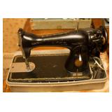 •	Portable singer with vinyl suitcase, gold seal, 4K927330 ~ 1953 Singer Model 201K-3 