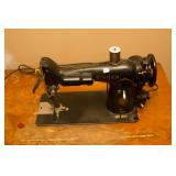 •	Singer Sewing machine with cabinet AL810705 – 1954 