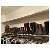 A wall of leather designer brand ankle boots