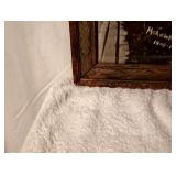 has a crack on the left side and some water stain in the upper left side shows  age ware.