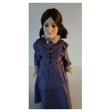 Doll  stands 14in tall 