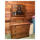 Carved wood antique dresser with mirror