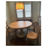 54" table with 5 chairs