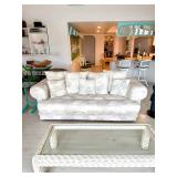 Palm leaf print sofa