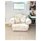 Palm leaf print armchair