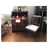 Ladies secretary with drop-down front that locks with key.