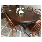 Solid oak table w/6 chairs. Base chalk painted black. Some minor stain on table top.
