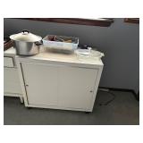 white wooden storage cabinet with sliding doors