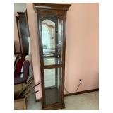 lighted wood and glass curio cabinet
