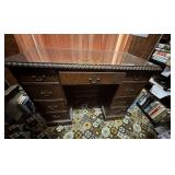 Dark wooden vintage desk, glass top, $500