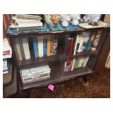 Book Shelf. 2 Shelves with sliding glass front.