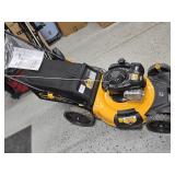 Lawnmower, gas, with waranty, used less than 10 hours