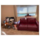 Leather loveseat and tableware