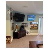 A TV and many other things to decorate your mancave.