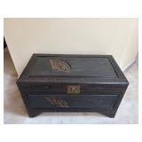 STUNNING Majestic dark-stained camphor wood chest which features intricaterelif carving of fans and 