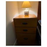 Bedside drawers and lamps.