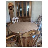 42" dining table, 2 16" leaves, with protective pads, 5 chairs, lighted hutch