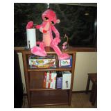Basement:  Stuffed Pink Panther, Shelf unit, Games