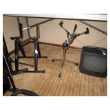 Basement:  Speaker z stand, Snare Drum stand, Sony TV