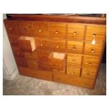 Garage:  Apothecary Cabinet 26 drawers, (2 drawers open)