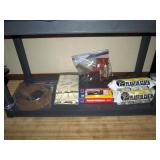 Basement:  Track Cork, Fences, Small Engine in Box, Woodland Scenics Plastic Cloth