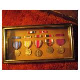 Living Room: Man was in the Navy WW2-His medals 