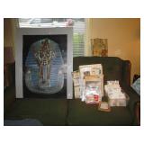 Living Room:  King Tut Poster, Lots of neat paper things, Plus more Posters