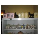 Kitchen:  Pink Plastic counter containers, Also yellow, Ton of Casserole Dishes, Egg Cups