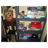 Living Room: Games-Monopoly-Sorry-Pay Day, Clock, Plant Stand, Plant,  
