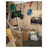 Garage:  Yard Spreader, Wheel Barrel, Golf Cart, And Buckets of Golf Balls