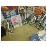 Up 1st Bedroom Right:  Toy Plastic Guitars, Coloring Book