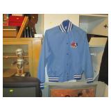 Downstairs 1st Room Right:  Disney Coat, Bottle Cap Man