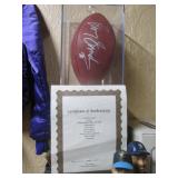 Living Room:  Barry Sanders Autographed Football